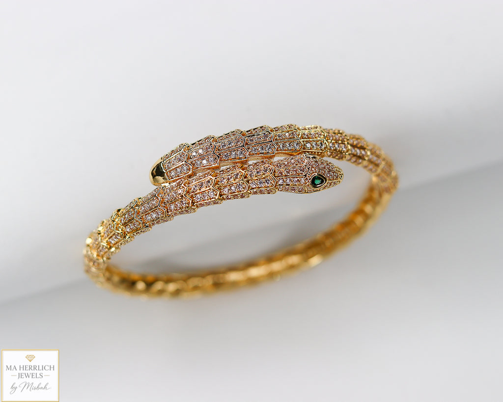 Green eyes and embellished with sparkling stones bracelet