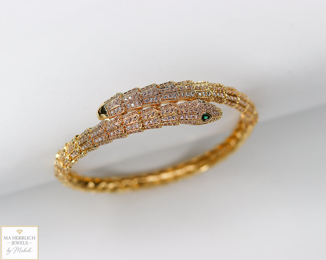 Green eyes and embellished with sparkling stones bracelet