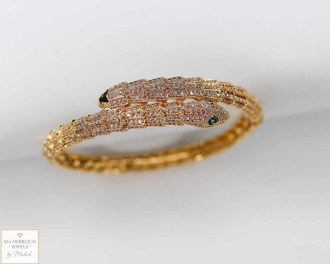 Green eyes and embellished with sparkling stones bracelet