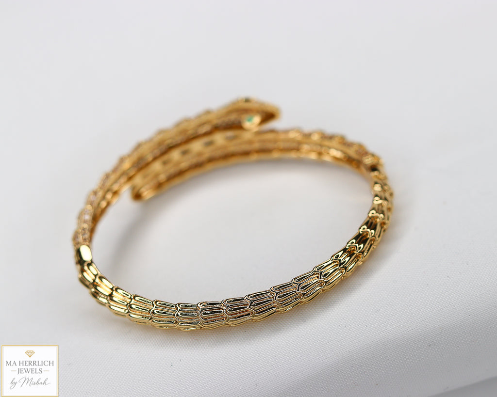 Green eyes and embellished with sparkling stones bracelet