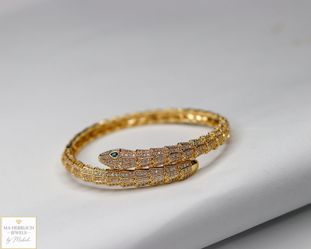 Green eyes and embellished with sparkling stones bracelet