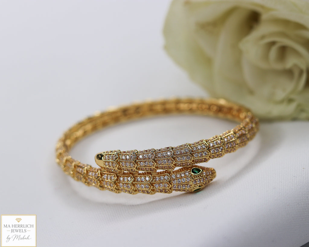 Green eyes and embellished with sparkling stones bracelet