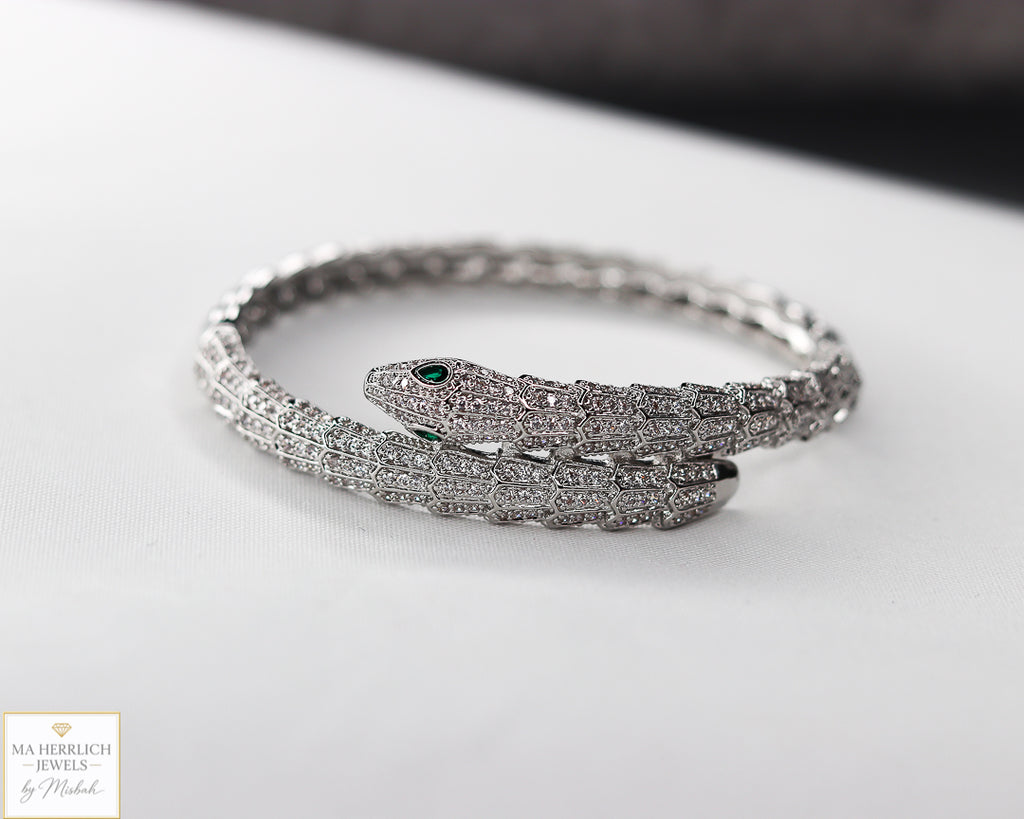 Green eyes and embellished with sparkling stones bracelet