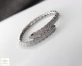 Green eyes and embellished with sparkling stones bracelet