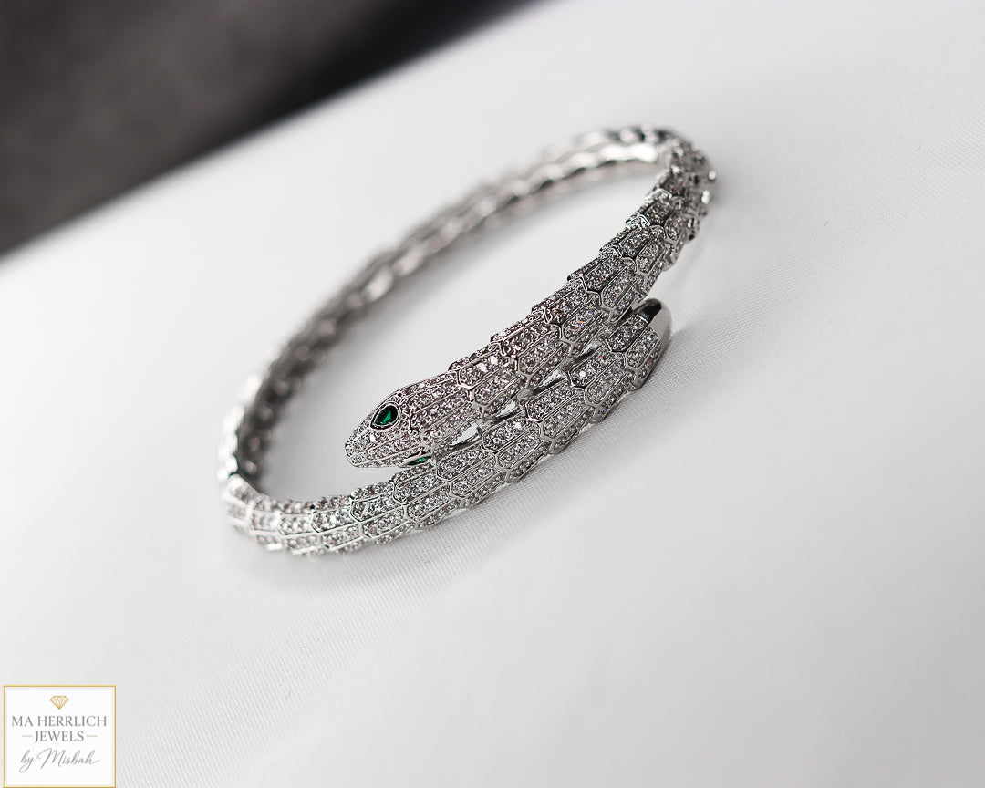 Green eyes and embellished with sparkling stones bracelet