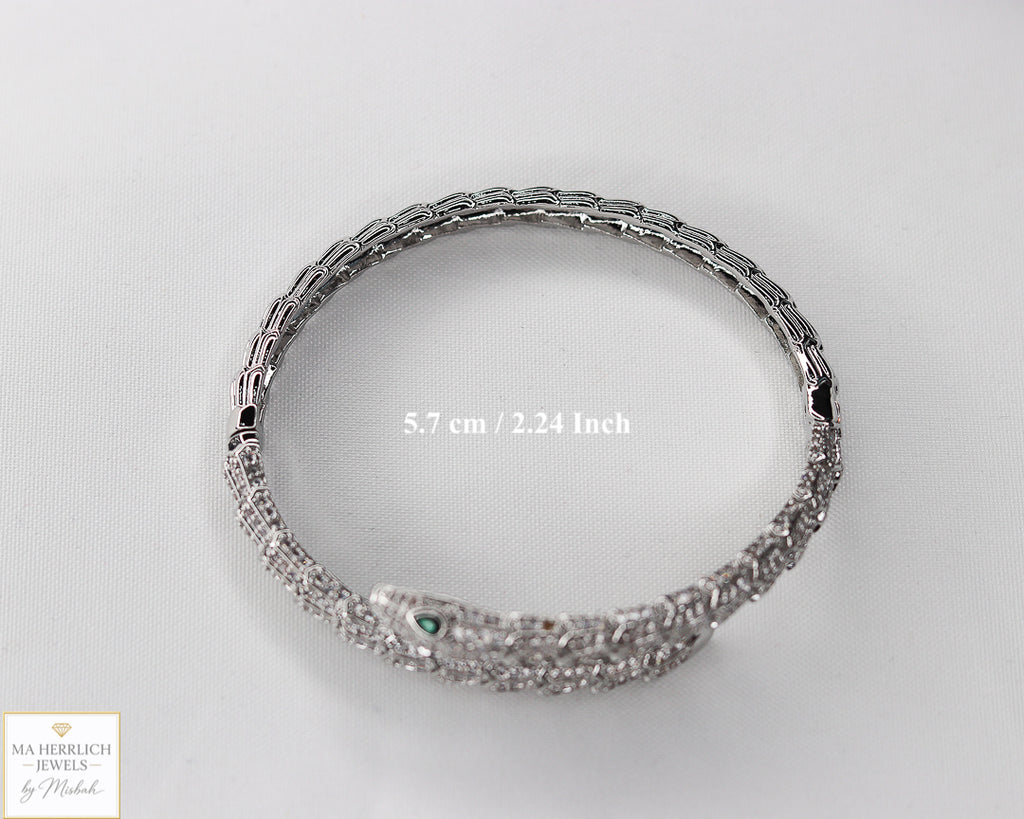 Green eyes and embellished with sparkling stones bracelet