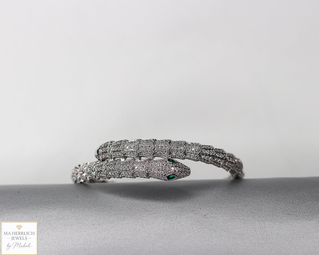 Green eyes and embellished with sparkling stones bracelet