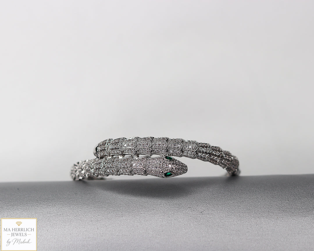 Green eyes and embellished with sparkling stones bracelet