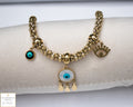 Gold Colour Bracelet With Charms